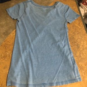 Light blue v neck small tee.